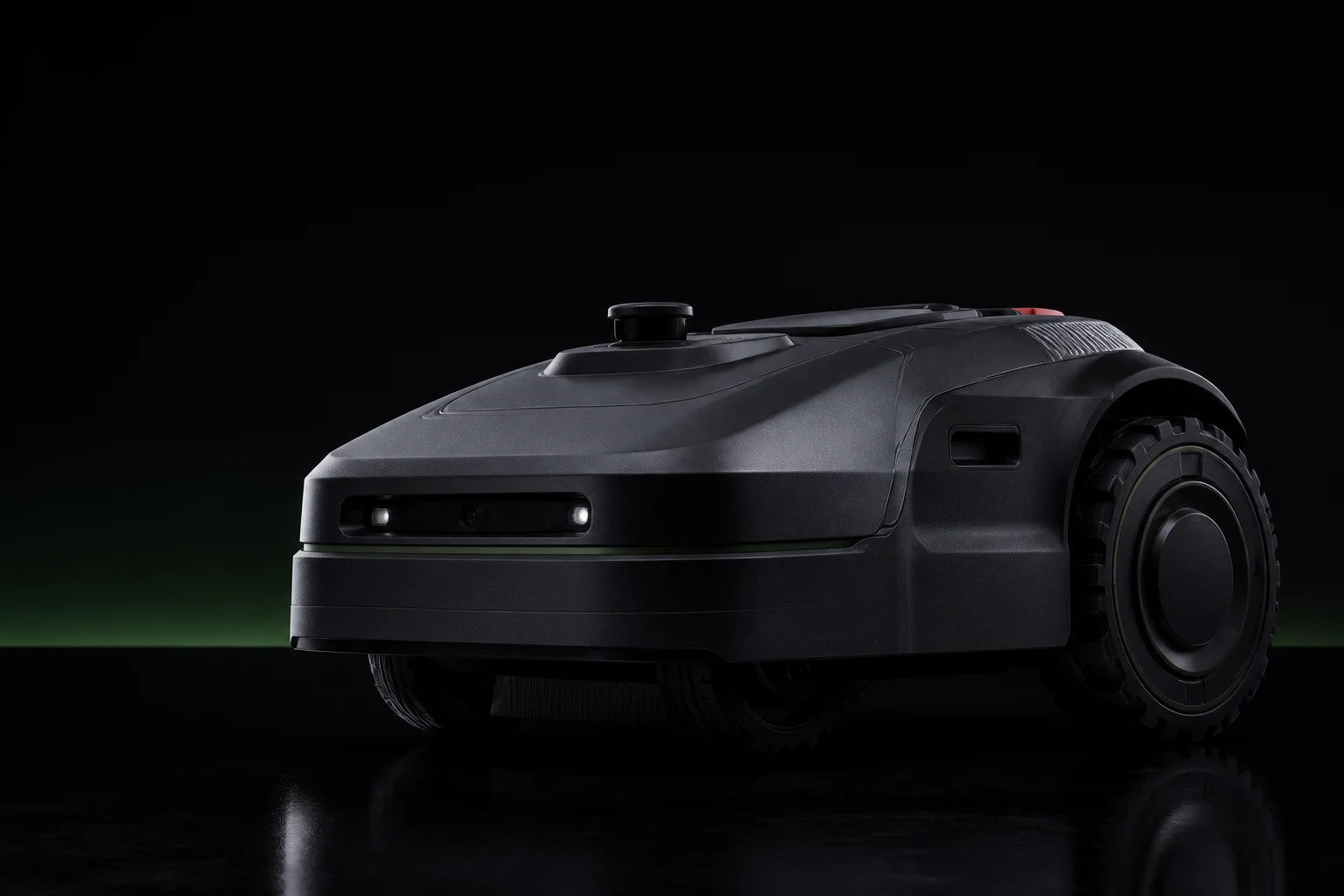 Autonomous lawn equipment shown in a dark studio setting